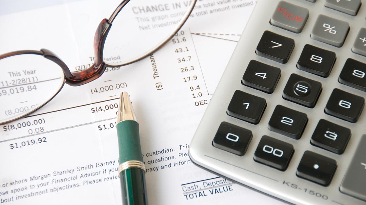 Financial document and calculator Financial document and calculator