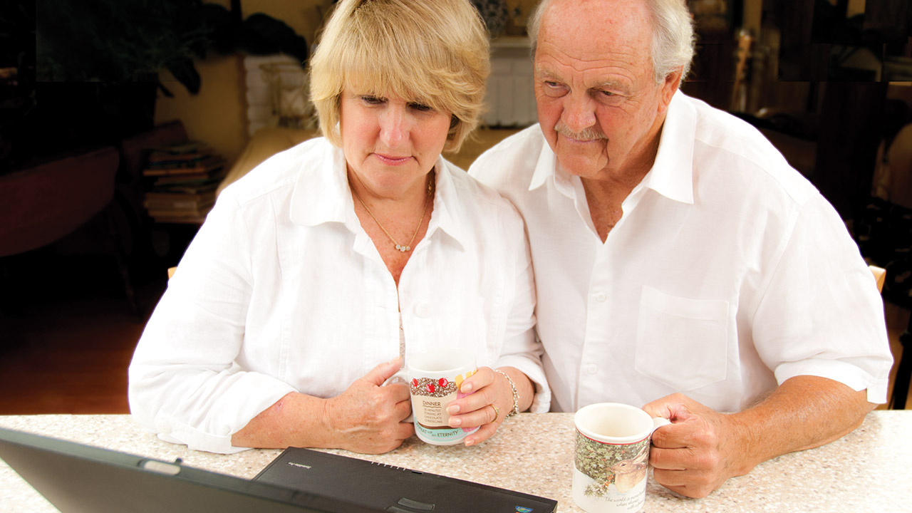 Senior couple using a laptop Senior couple using a laptop
